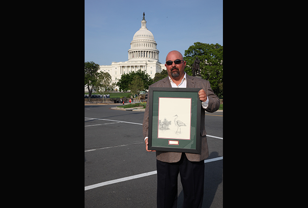 Mark Abramson with his Conservation and Restoration award