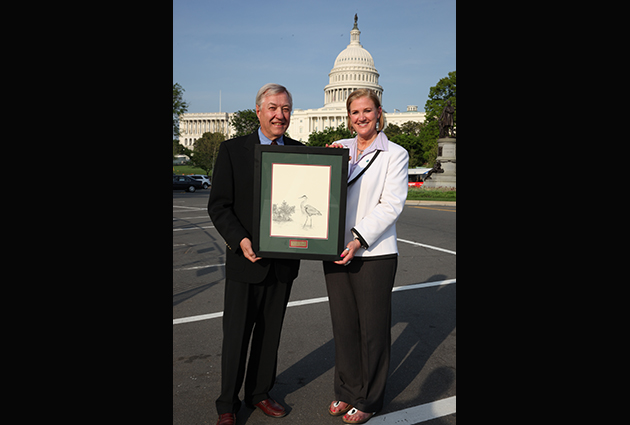 Dr. W. Carter Johnson with Kim Berns of the Natural Resources Conservation Service, who presented his award